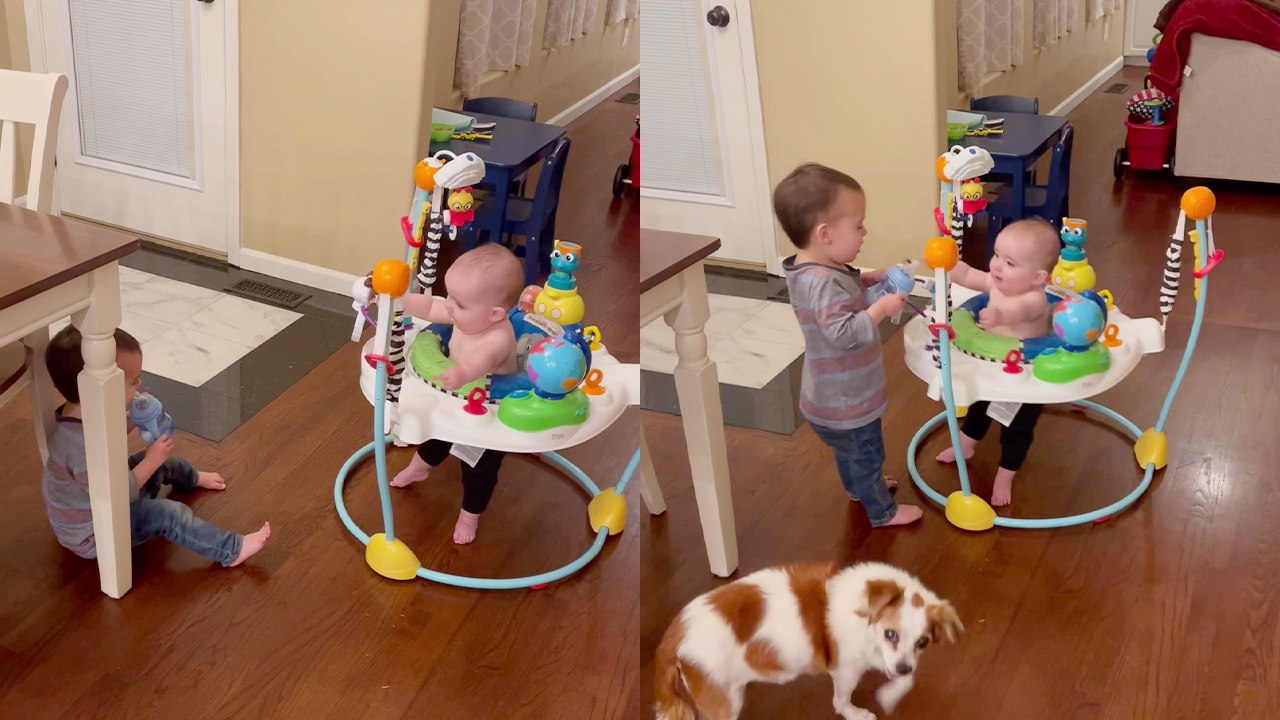 Boy falls down after his baby brother suddenly lets go of cup!