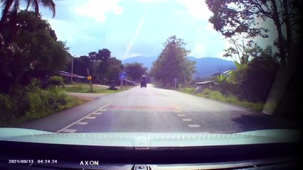 Precariously Stacked Tires Fall Off Truck