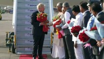 PM greeted with bouquets of roses on arrival in India