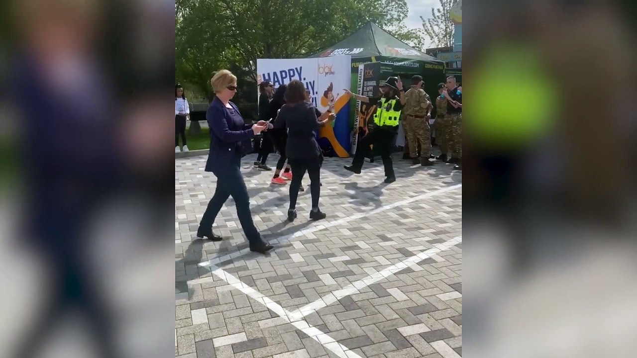 Footage of police officer bhangra dancing at Co...