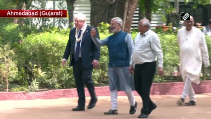 UK PM Boris Johnson tries his hands on ‘Charkha’ at Sabarmati Ashram