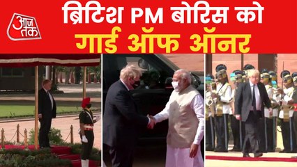 Tải video: British PM Boris Johnson receives the guard of honour