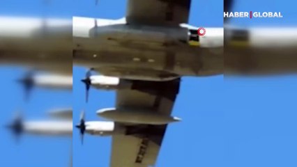 Paraşütü açılmayan Yunan komandosu uçakta asılı kaldı!