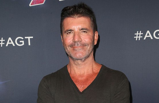 Simon Cowell scaled back his work because he was terrified of suffering from burn-out