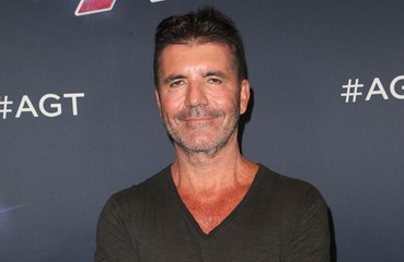 Simon Cowell scaled back his work because he was "terrified" of suffering from "burn-out"