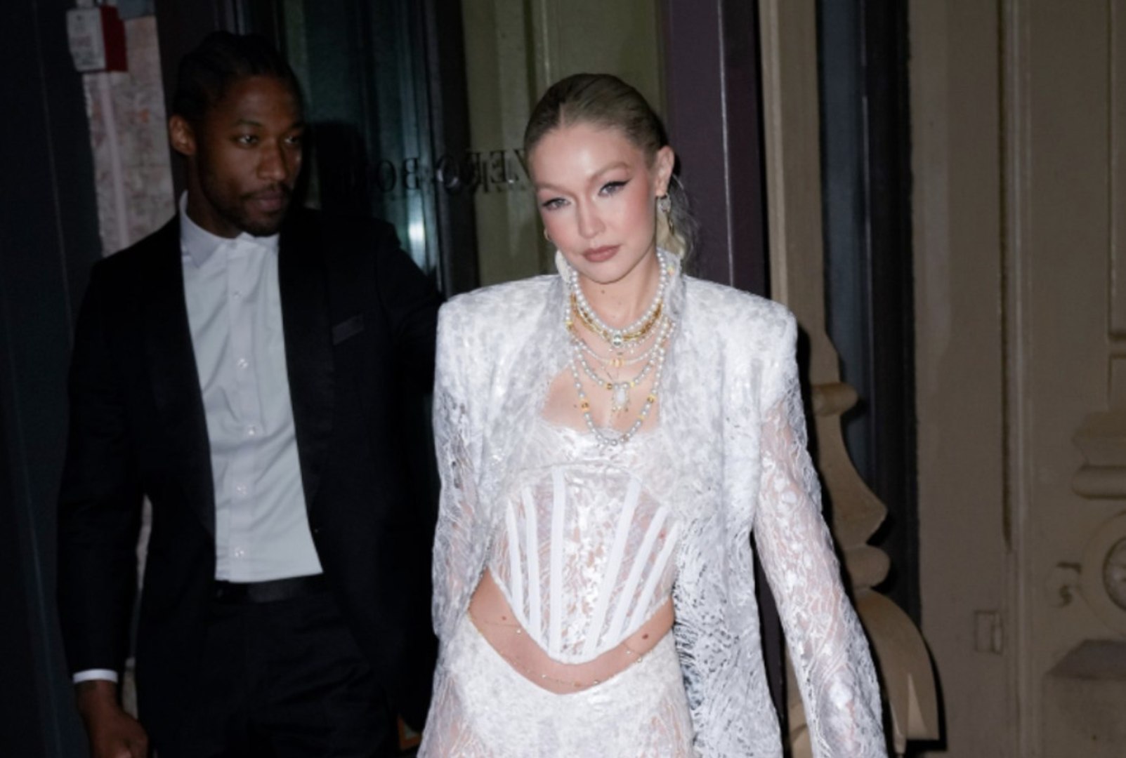 Gigi Hadid Walked the Versace Runway in a Sheer Corseted Gown That Slung  Below Her Butt