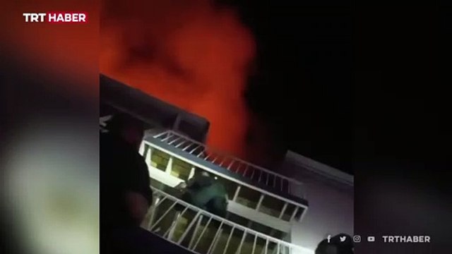 ABD'de bir bebeğin yangından kurtarıldığı anlar polis kamerasında