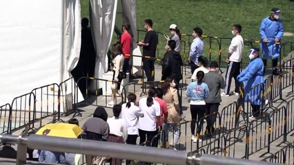 بكين توسع حملة فحوصات التشخيص فيما هاجس الاغلاق يخيم