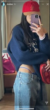 Dua Lipa Maximized Her Thong's Exposure with a Pair of Baggy, Low-Rise Jeans