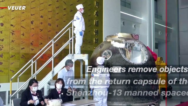 Watch Engineers Take Objects Out of Shenzhou-13's Return Capsule