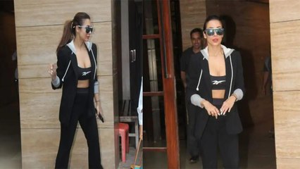 Malaika Arora घर के बाहर काला चश्मा लगा हुईं स्पॉट, Helper से अपना Bag उठवाकर हुईं Troll | FilmiBeat