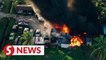 20 vehicles razed in workshop fire at Mersing