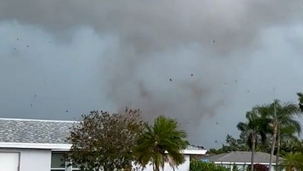 Strong wind sends debris flying