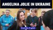 Angelina Jolie visits war-torn Ukraine, meets children and volunteers | Oneindia News