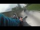 Guy Crashes Into Another Guy While Riding Down Mountain Slide