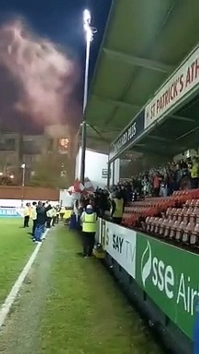 Derry City fans celebrate at Richmond Park