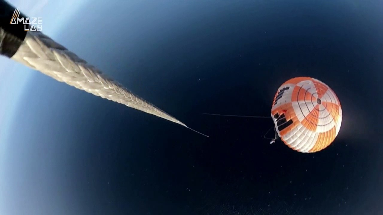 Rocket Lab Catches Reusable Falling Rocket With...