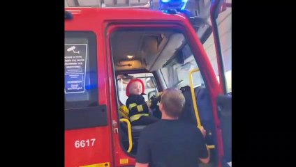 Two year old aspiring firefighter tours local station