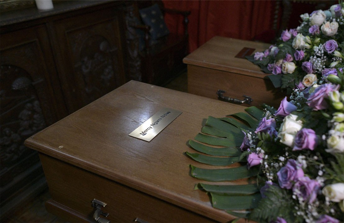 Woman bangs on coffin lid to stop her own funeral because she wasn't dead!
