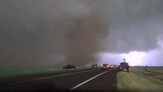 Tornado carries red dust along its path through Texas