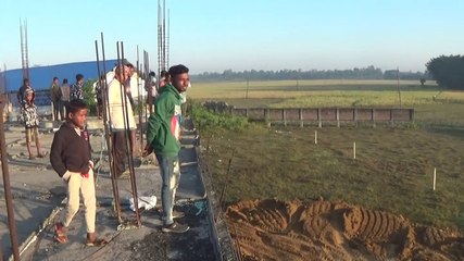 Wild elephant crossing near villagers home