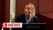 Amber Heard testifies Johnny Depp slapped her when she laughed at tattoo