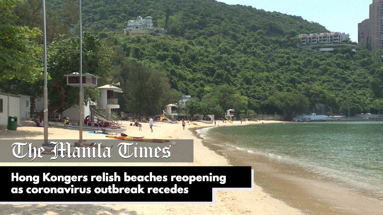 Hong Kongers relish beaches reopening as coronavirus outbreak recedes