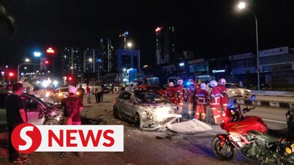 Car burns in six-vehicle accident