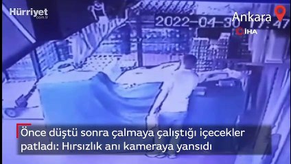 Önce düştü sonra çalmaya çalıştığı içecekler patladı: Hırsızlık anı kameraya yansıdı