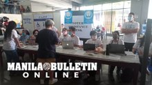 Members of the PPCRV assist voters in San Juan City