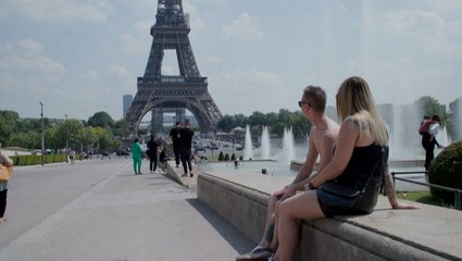 Enjoying the warm weather under the Eiffel Tower