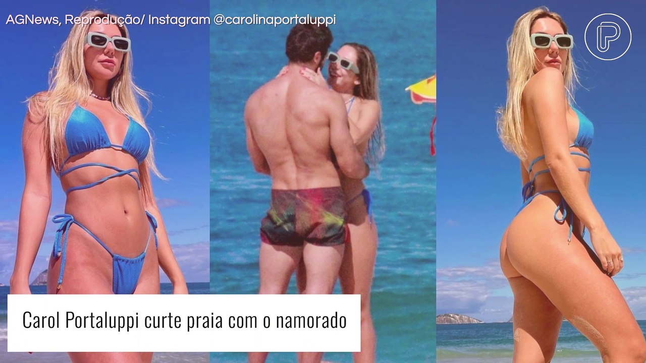 De fio-dental, Carol Portaluppi faz a temperatura subir em dia de praia com o namorado. Fotos!