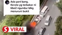 Video captures moment car on fire rolls backwards on Genting road