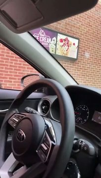 Squirrel Caught Eating Fried Chicken in a Fast Food Drive-Thru