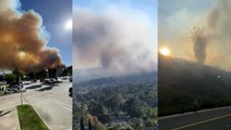 Wind-driven fire burns through neighborhood in Southern California
