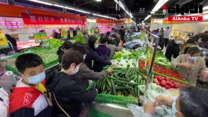 تهافت على شراء السلع في بكين بعد انتشار شائعات عن إغلاق