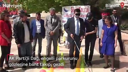 AK Parti'li Dağ, engelli parkurunu gözlerine bant takıp, gezdi