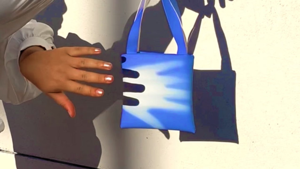 This designer combines technology and fashion to create color-changing accessories and clothes