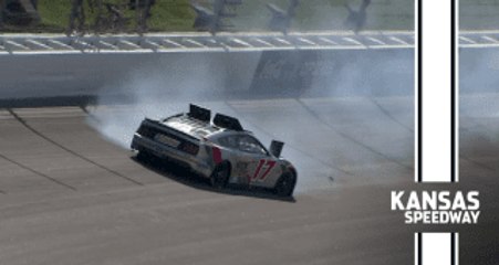 Chris Buescher spins during practice at Kansas