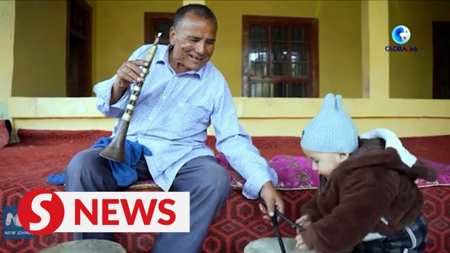 Xinjiang, My home: Inheritor of intangible cultural heritage suona