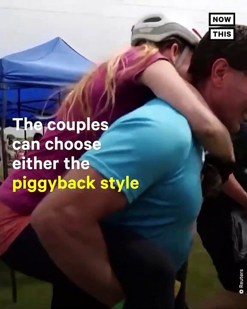 Couples Compete in Wife-Carrying Obstacle Course
