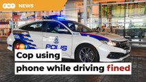 Cop fined for using phone while driving