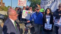 Nick Gibb confronts protestors outside the Bognor Regis Golf Club