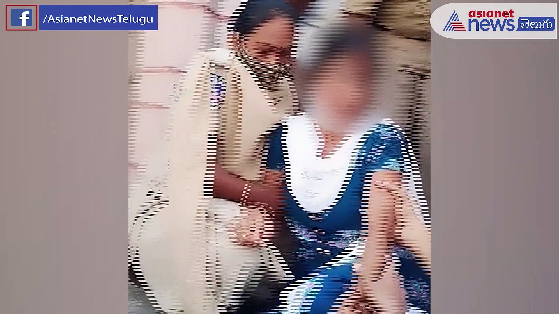 తెలంగాణ  హైకోర్టు లో మహిళ  ఆత్మహత్య యత్నం (వీడియో)