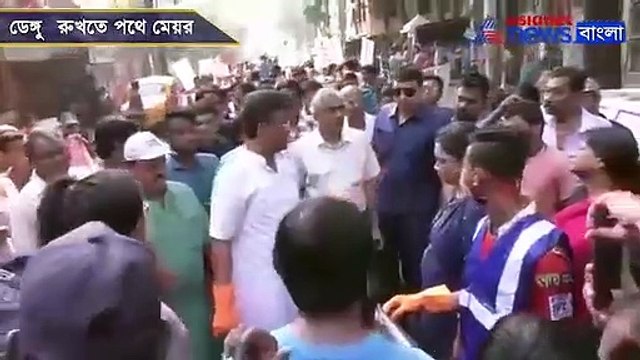 Mayor Firhad Hakim cleans garbage to spread Dengue awareness in Kolkata