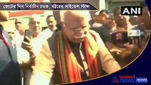 Manohar Lal Khattar rides a cycle to the polling booth