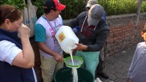Productores de Pueblo Nuevo reparten leche en honor a San Isidro Labrador