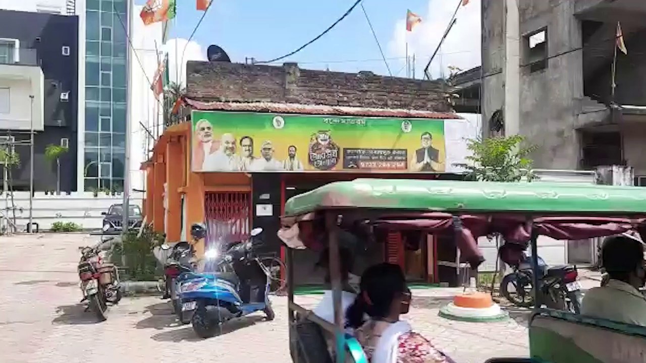 In the office of Krishna Kalyani, pictures of Debasree Chaudhuri covered by white paper