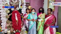 Trinamool supporters pray in front of kali for the victory of Mamata Banerjee