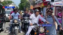 Madan Mitra has seen riding a bike for Mamata Banerjee for Election campaign